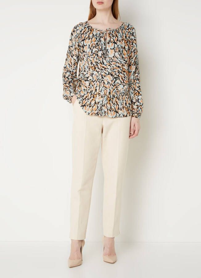 Claudia Strä, ter Tuniek met print en ballonmouw